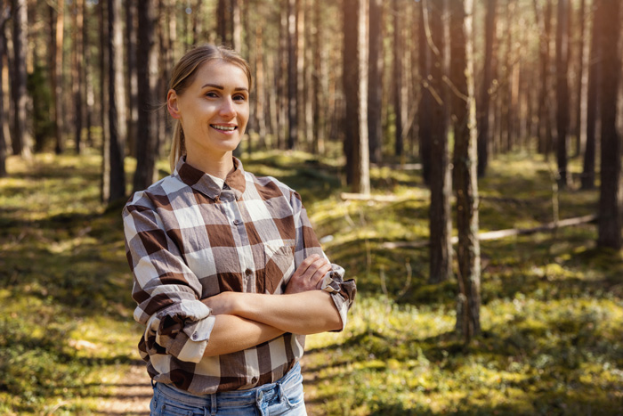 Student in the woods.